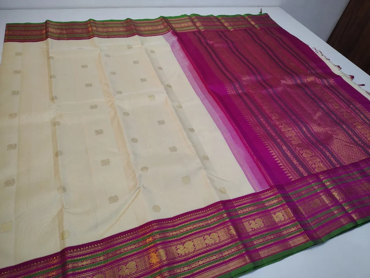 Magenta Zari Border and Woven Motifs Saree
